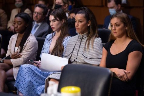 Gymnasts and former patients of Nassar wait in the courtroom to give their account