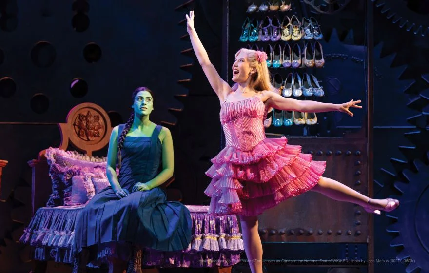 Jessie Davidson playing as Elphaba and Zoe Jensen playing as Glinda in the National Tour of WICKED